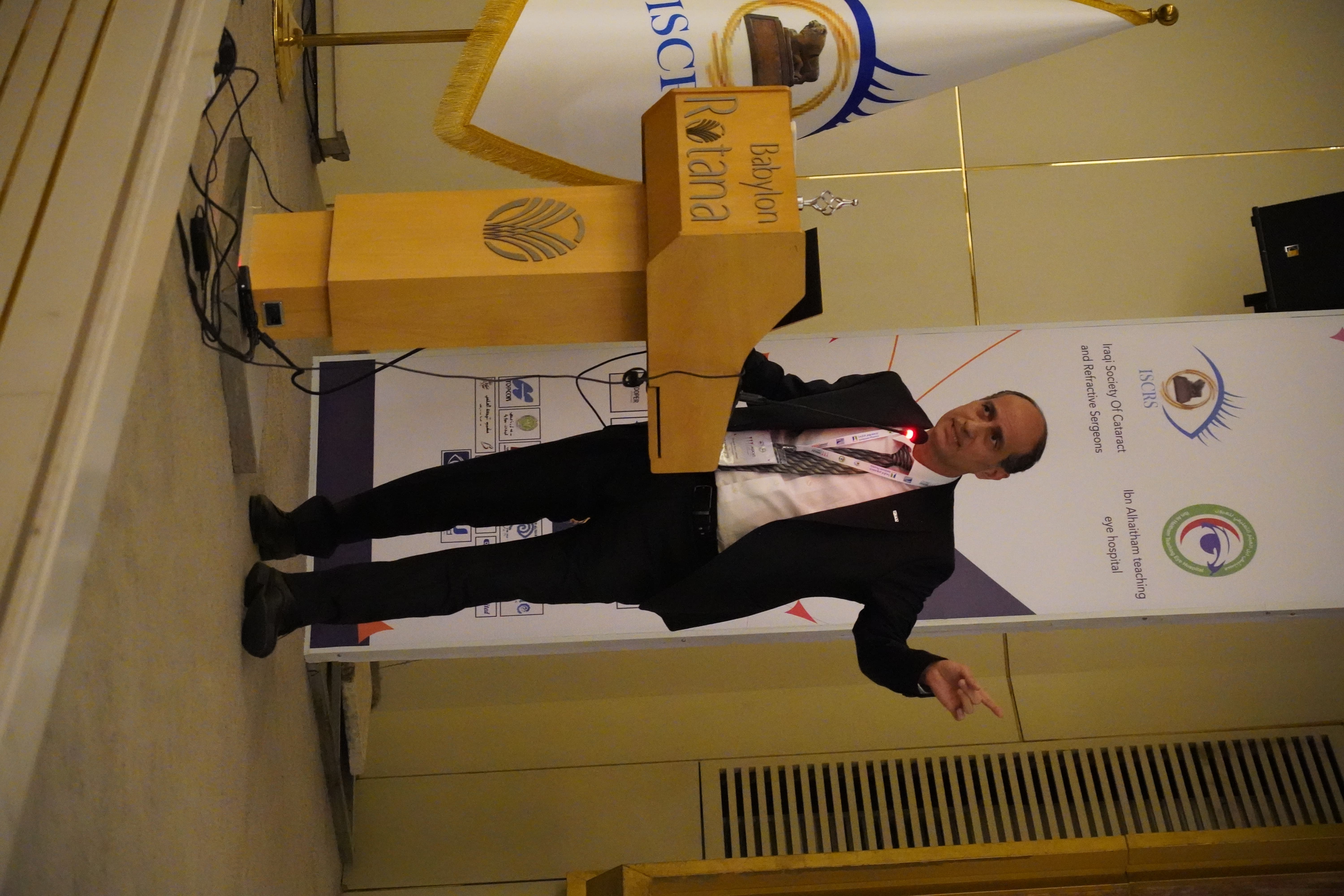 Speaker presenting at MOCAT 1 with ISCRS branding